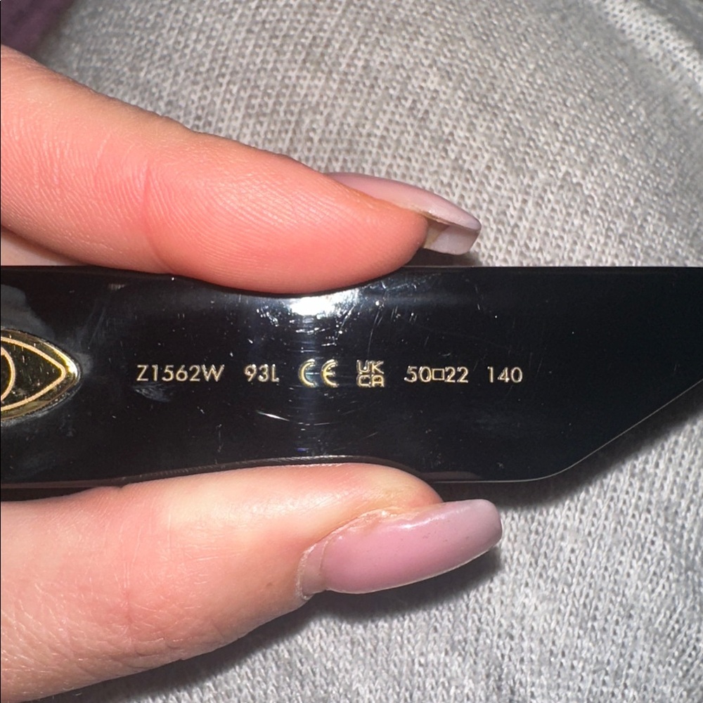 Louis Vuitton Black Sunglasses with Gold Accents - Picture 5 of 5